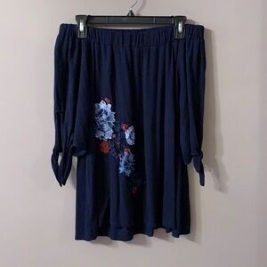 Off the shoulder navy blue blouse with flowers Small pebble and stone
